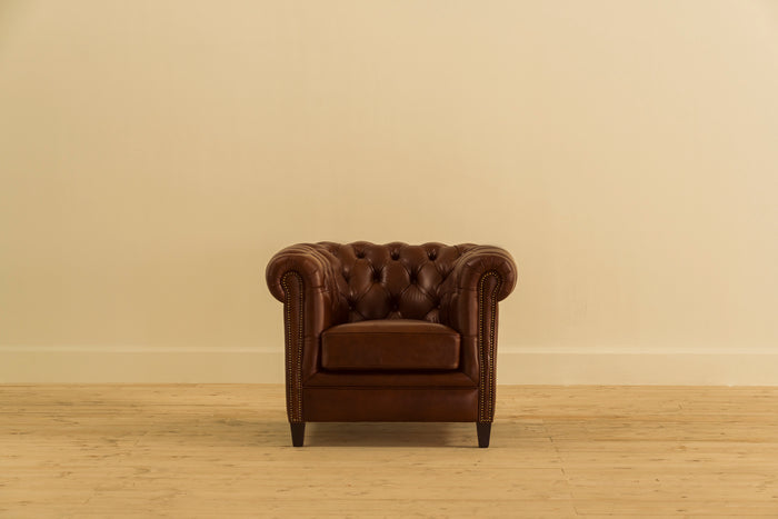 Brown leather armchair chesterfield
