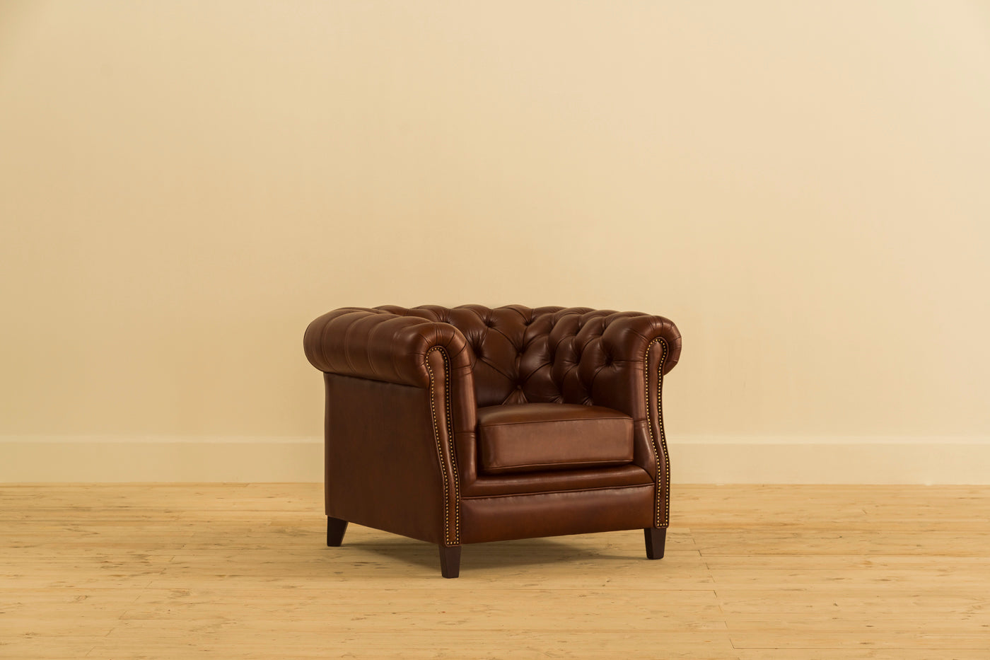 Brown leather armchair chesterfield