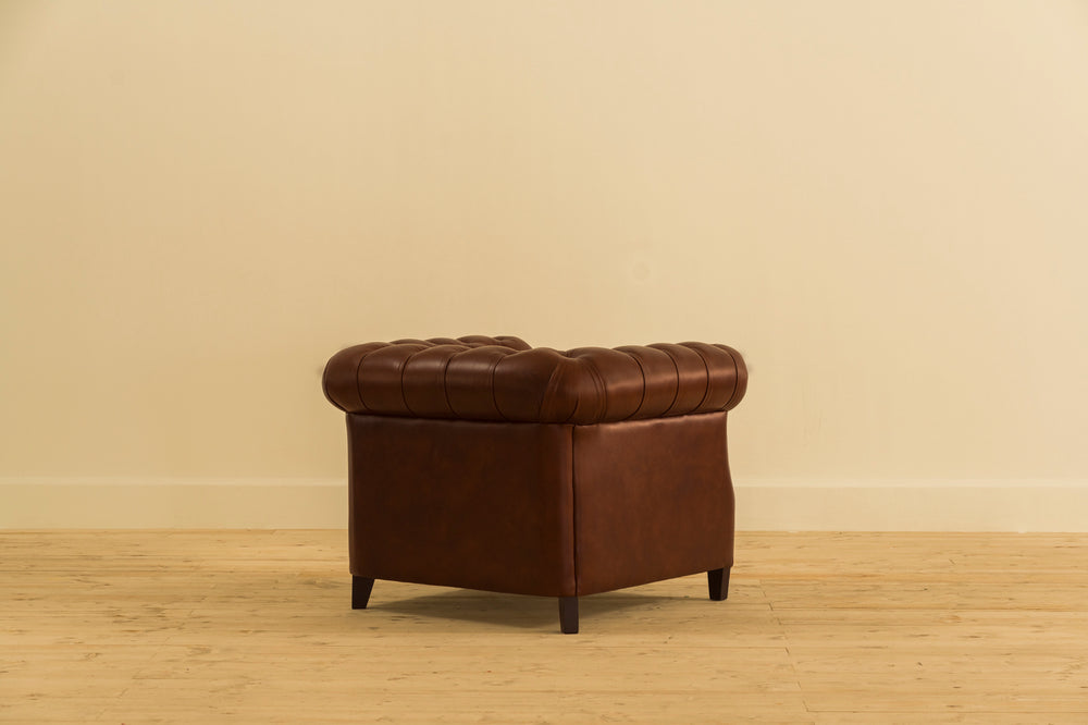 Brown leather armchair chesterfield