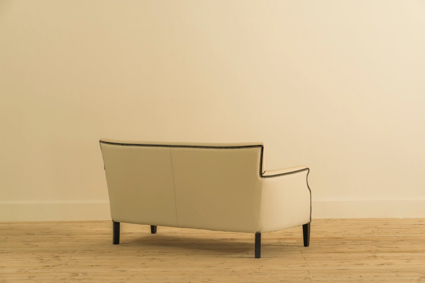 BEIGE LEATHER 2 SEATER SOFA MID CENTURY CHESTERS INDIA