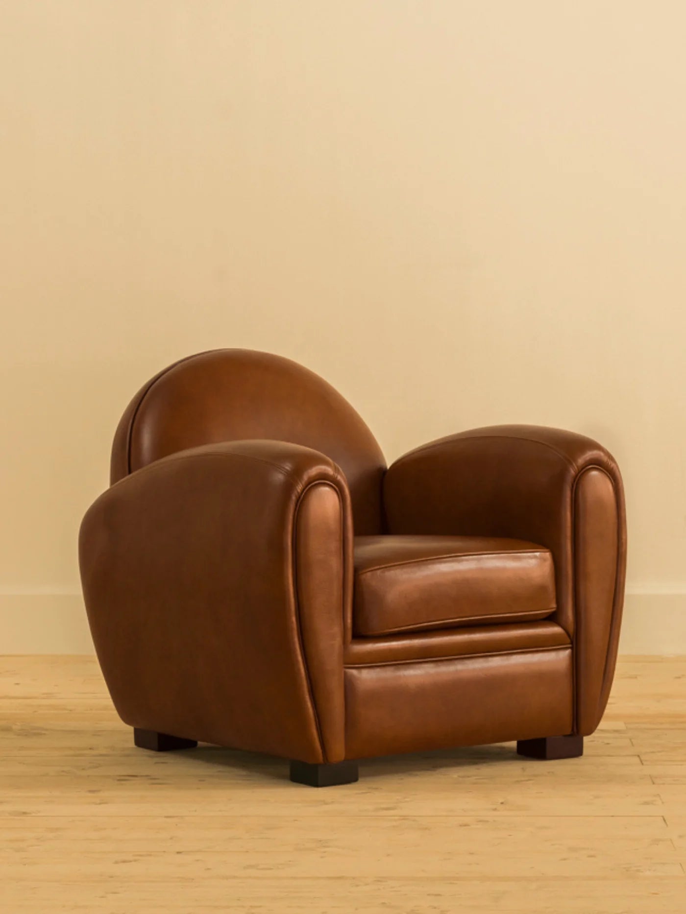 Madame Armchair by Chester's India, a 20th-century French club classic in Shadow Red Brown full grain cowhide leather with hand-finished solid teak wood.